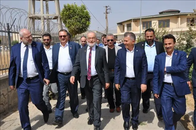TEMEL KARAMOLLAOĞLU&acute;NDAN ZAHİRECİLERE ZİYARET.